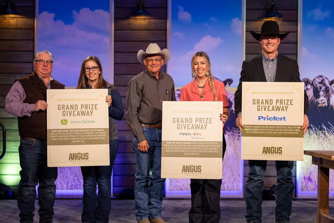 Braden Forker of Nebraska won a Priefert S04 squeeze chute at the 2025 Angus Convention in Kansas City, alongside Dale Jenkins of Texas, winner of a Trans Ova service voucher, and Doug Velisek of Maryland who won a John Deere Gator™ XUV 845M crossover utility vehicle.    Pictured from left: Do